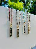 Adjustable necklace with rhodium-plated beads and red Miyuki beads
