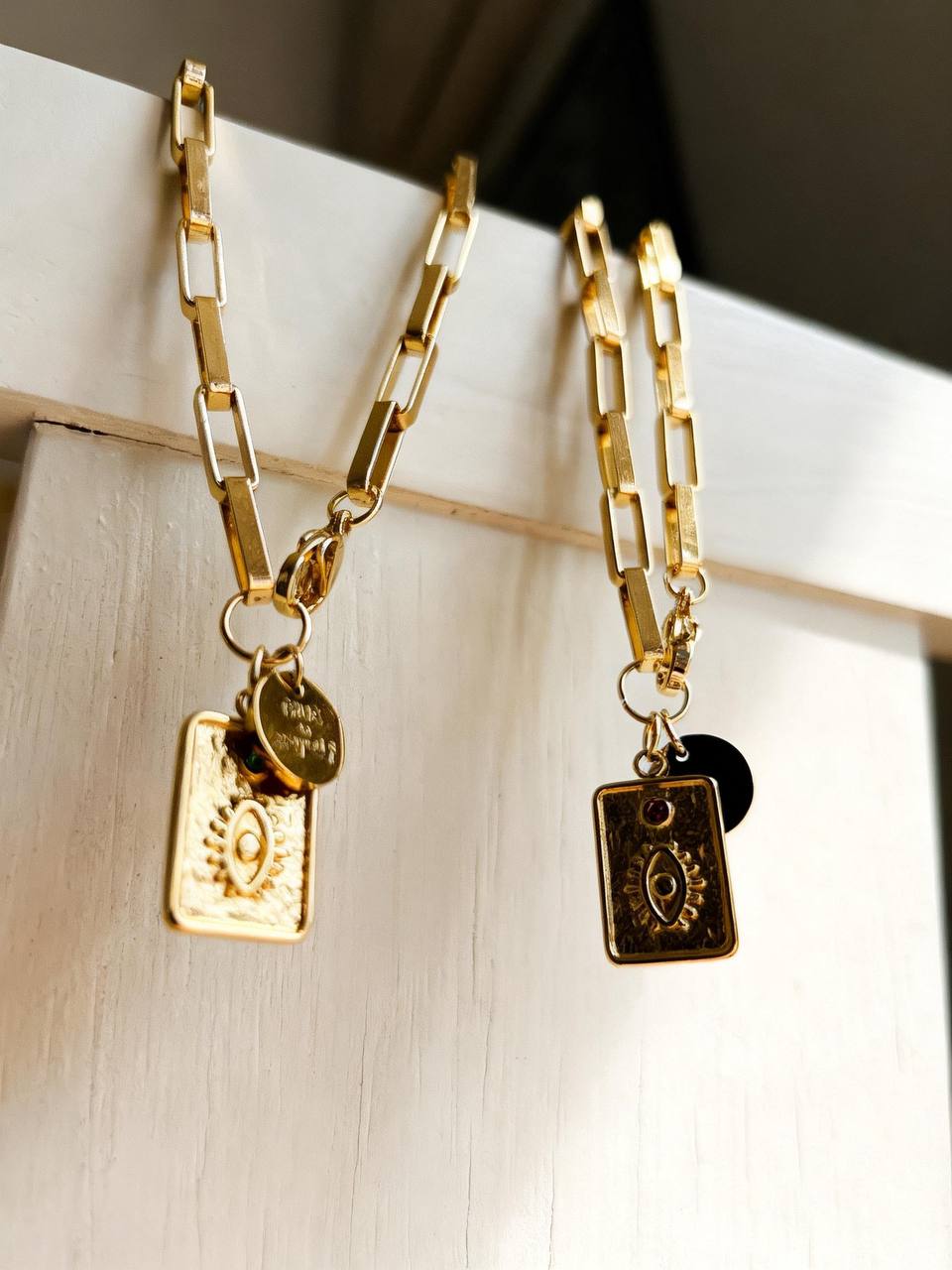 Rhodium-plated chain with thick rectangular links and steel charms