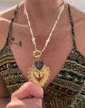 Medium-length necklace and large steel pendant heart