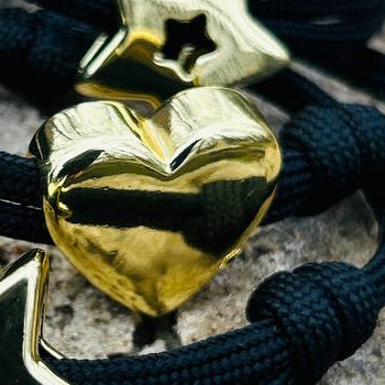 Adjustable paracord bracelet with rhodium charm | HEART